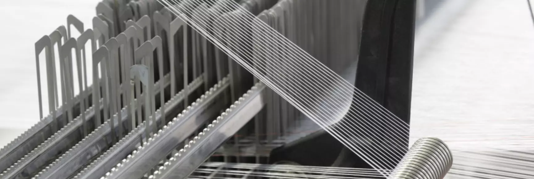 Manufacturing equipment at The Payen Group. The firm has used LYCRA® fiber since its launch to produce quality textiles.